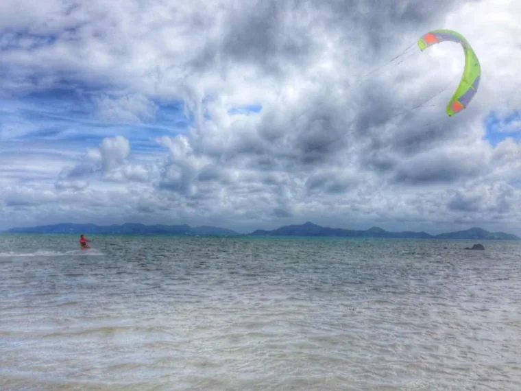 View across the bay from the beach with distant islands